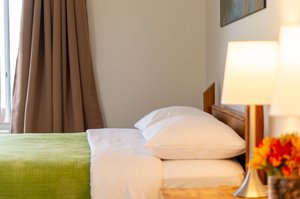 Wayside Motel Manitoulin in Manitoulin Island, image may contain: Cushion, Lamp, Linen, Table Lamp