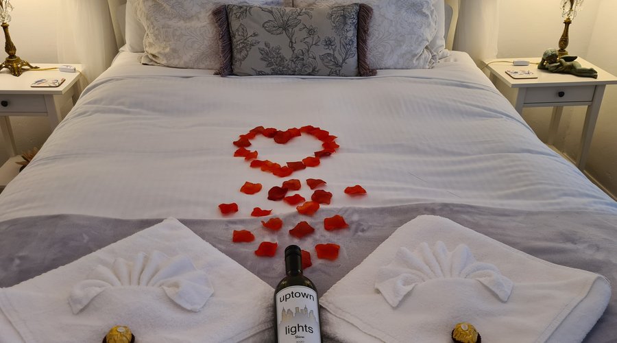 Romance is in the air - bed prepared for a Special Anniversary in Cloud9. 