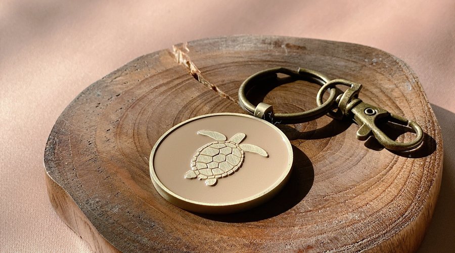 Casted from hand-drawn Maldivian elements, our keychains are fashioned to keep your keys in place, in a durable enamel and alloy metal finish. Features a split keyring & large lobster claw for added functionality.