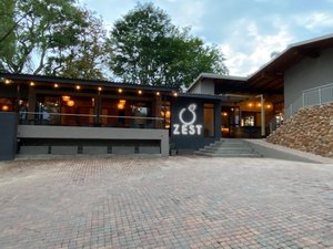Lowveld Living Guesthouse in Nelspruit, image may contain: Hotel, City, Cobblestone, Street
