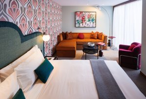 Ovolo South Yarra in South Yarra, image may contain: Dorm Room, Furniture, Couch, Home Decor