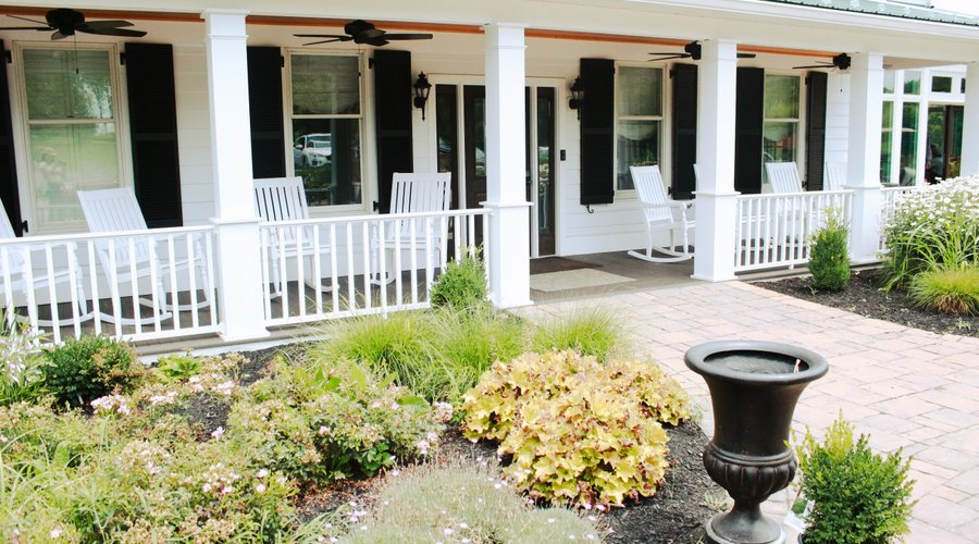 The front entrance of the Inn.  Relax on the front porch, read a book and enjoy a great view of all of the happenings on this 160-acre organic farm.