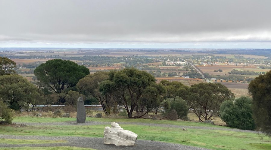 view with some sculptures in the foreground