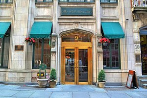 The Wall Street Inn in New York City, image may contain: Awning, Canopy, Plant, City