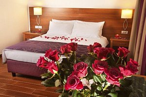 Hotel Galileo Prague in Prague, image may contain: Rose, Flower, Furniture, Bed
