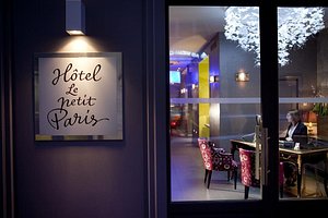 Hotel le Petit Paris in Paris, image may contain: Lighting, Cafe, Restaurant, Dining Room
