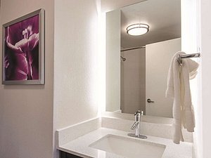 La Quinta Inn & Suites by Wyndham Portland in Portland, image may contain: Sink, Sink Faucet, Indoors, Corner
