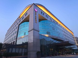 Grand Mercure Beijing Dongcheng in Beijing, image may contain: Office Building, Convention Center, Hotel, City