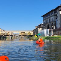 2023 Kayak on the Arno river in Florence under the arches of the Old Bridge