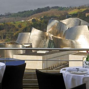 Gran Hotel Domine Bilbao in Bilbao, image may contain: Office Building, City, Person, Outdoors