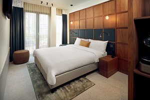 Met Hotel in Amsterdam, image may contain: Interior Design, Corner, Furniture, Bed