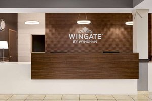 Wingate by Wyndham Lethbridge in Lethbridge, image may contain: Reception, Table, Furniture, Indoors