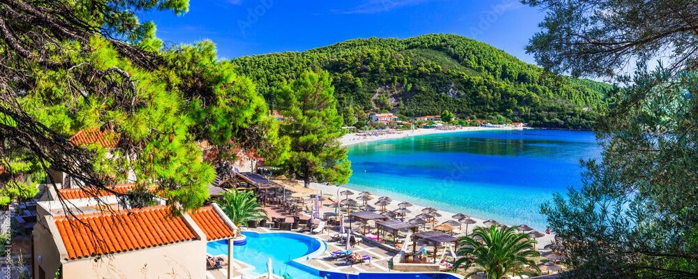 The Ionisi is on the beach in in the stunning Panormos Bay on the Blue Green island of Skopelos. 16 boutique accommodation rooms, restaurant and beach bar. Open to non residents with new sun beds