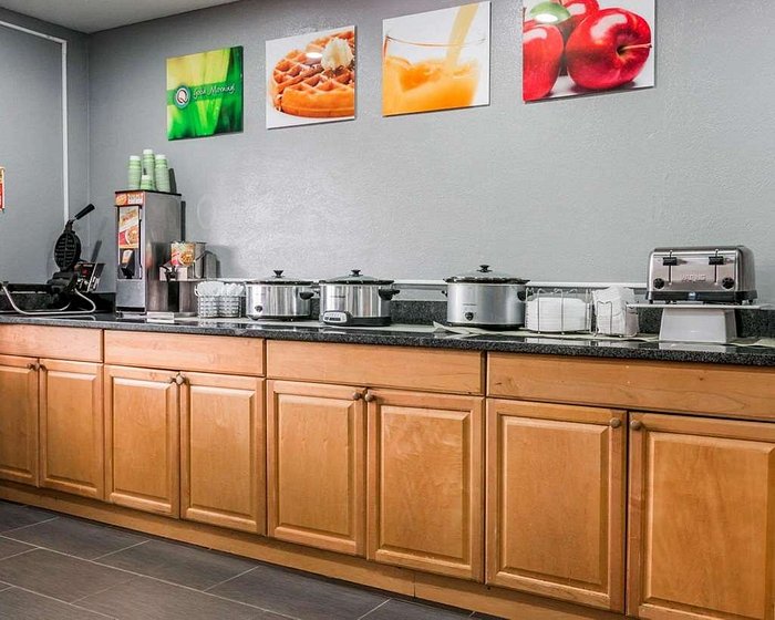 Premium Photo  A kitchen with orange appliances and a clock on