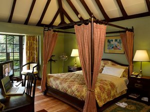Windsor Golf Hotel and Country Club in Nairobi, image may contain: Furniture, Bedroom, Indoors, Bed