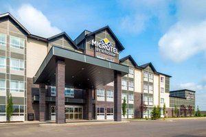 Microtel Inn & Suites by Wyndham Red Deer in Red Deer, image may contain: Office Building, Hotel, Convention Center, Inn