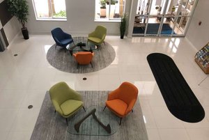 hom hotel + suites, Trademark Collection by Wyndham  in Gainesville, image may contain: Indoors, Furniture, Foyer, Floor