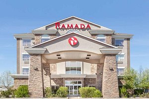 Ramada by Wyndham Brooks in Brooks, image may contain: Portico, Housing, Building, House