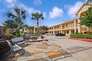 Super 8 by Wyndham Houston Hobby Airport South in Houston, image may contain: Hotel, Villa, Resort, Chair