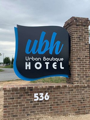Urban Boutique Hotel, BW Signature Collection in Greenville, image may contain: Brick, Advertisement, Symbol
