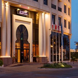 Mercure Grand Hotel Seef in Seef, image may contain: City, Office Building, Urban, High Rise