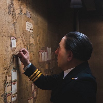 A man looking at the map in the Churchill War Room in London