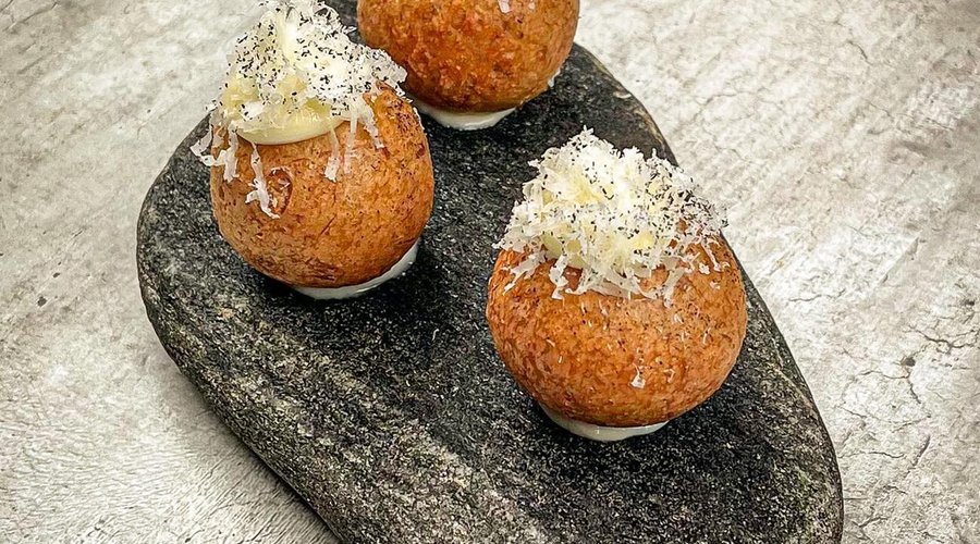 Appetizers served on top of a fjord rock