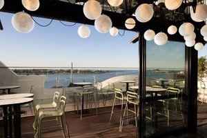 QT Newcastle in Newcastle, image may contain: Restaurant, Waterfront, Cafe, Lighting
