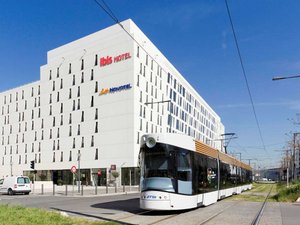 Ibis Marseille Centre Euromed in Marseille, image may contain: Office Building, Building, Car, City