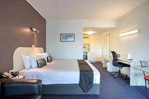 Best Western Zebra Motel in Coffs Harbour, image may contain: Dorm Room, Furniture, Bed, Chair