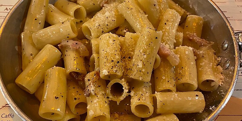 Rigatoni alla Gricia in a metal bowl