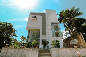 White Pearl Residency in Pondicherry, image may contain: Villa, Housing, Condo, Plant