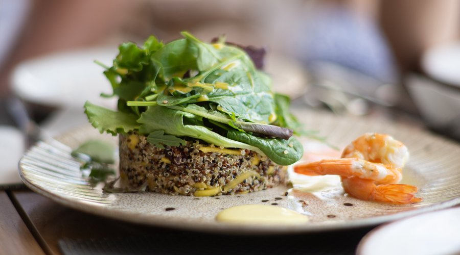 Akti our own home salad with quinoa, shrimps, mango, orange,avocado and lemon vinaigrette