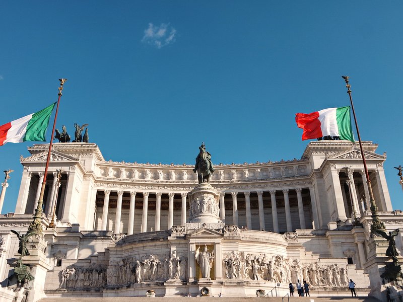 People visiting the Piazza Venezia in Rome during the day