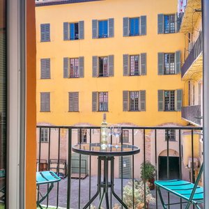 Aparthotel AMMI Vieux Nice in Nice, image may contain: Balcony, Chair, Screen, Monitor