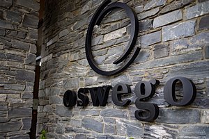 The Oswego Hotel in Vancouver Island, image may contain: Brick, Wall, Symbol, Text