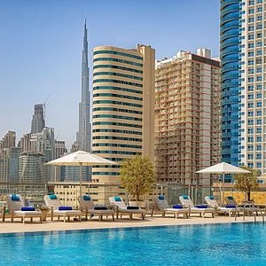Our guests can chill and relax by the pool with mesmerizing Burj views