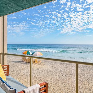 Private balconies and panoramic ocean views from our beach-level Ocean Front rooms with 2 Queen Beds