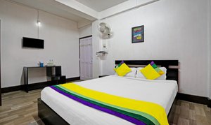 Itsy By Treebo - Shelter Inn in Shillong, image may contain: Interior Design, Monitor, Screen, Computer Hardware