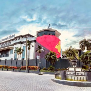 Lamana Hotel street view with PNG flag during Papua New Guinea Independence weekend and PNG Official National celebrations.