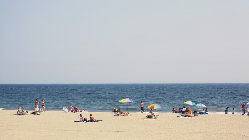 People on beach at Rockaway Beach in Queens, New York