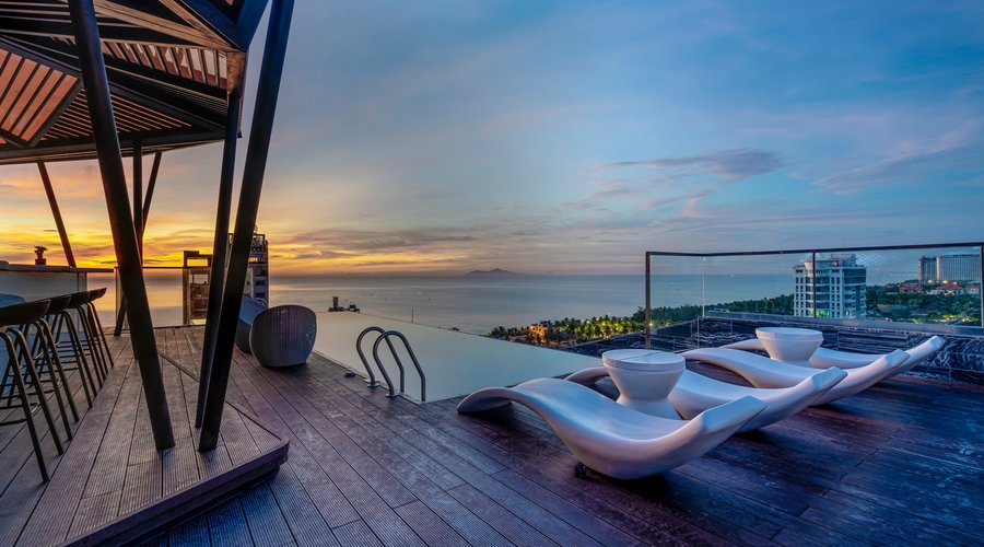 Sunrise by the infinity pool