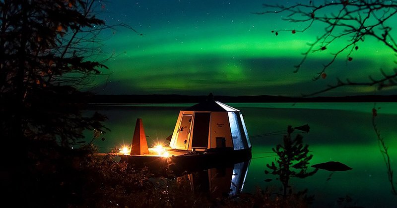 Luxury glass cabin on the lake at Peace & Quiet Hotel in the Swedish Lapland