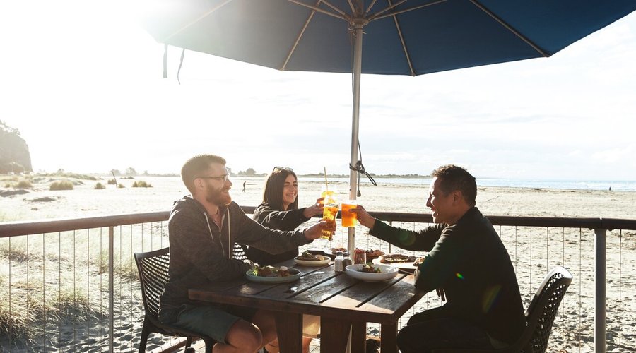 Enjoy the sun on our deck - right on the beach!