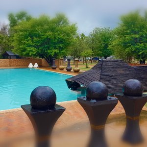 Large pool with covered, cold-water jacuzzi.