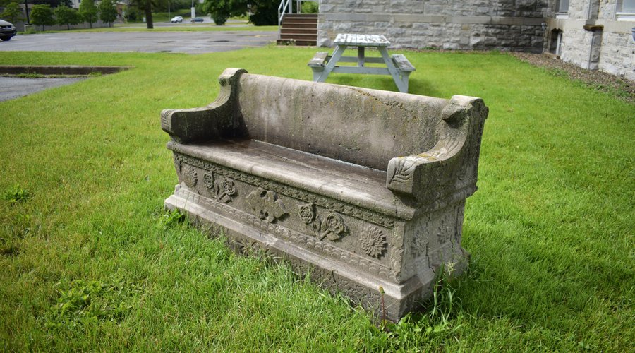 Old stone bench on the Museum property, part of our national collection as it came from St. Vincent de Paul Penitentiary in Laval, Quebec