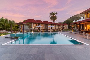 Sarasiruham Resort in Eklingji, image may contain: Hotel, Resort, Villa, Pool