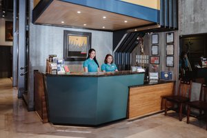 GQ Plaza in Panay Island, image may contain: Table, Furniture, Reception, Indoors