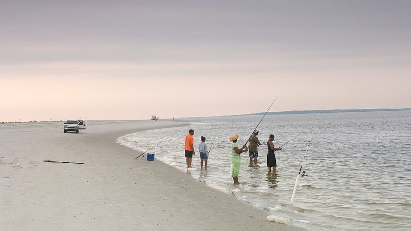 Group of people fishing at American Beach on Amelia Island, Florida 