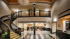 Best Western Plus Northwest Inn & Suites in Houston, image may contain: Foyer, Indoors, Staircase, Chandelier